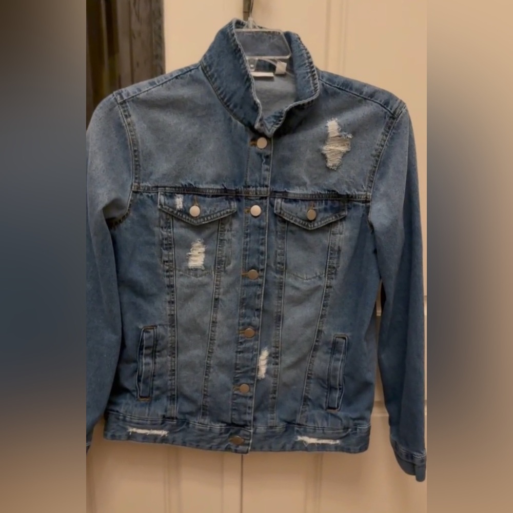 BP denim jacket, size Med Jacket has distressed details.